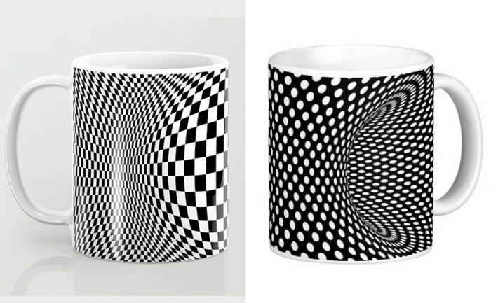 Two optical illusion coffee mugs, one black with white dots and one black with white squares