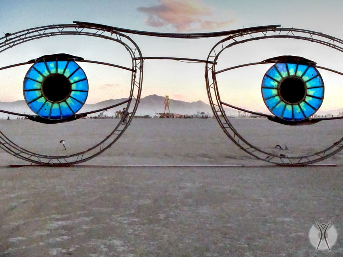 A huge pair of glasses on the beach