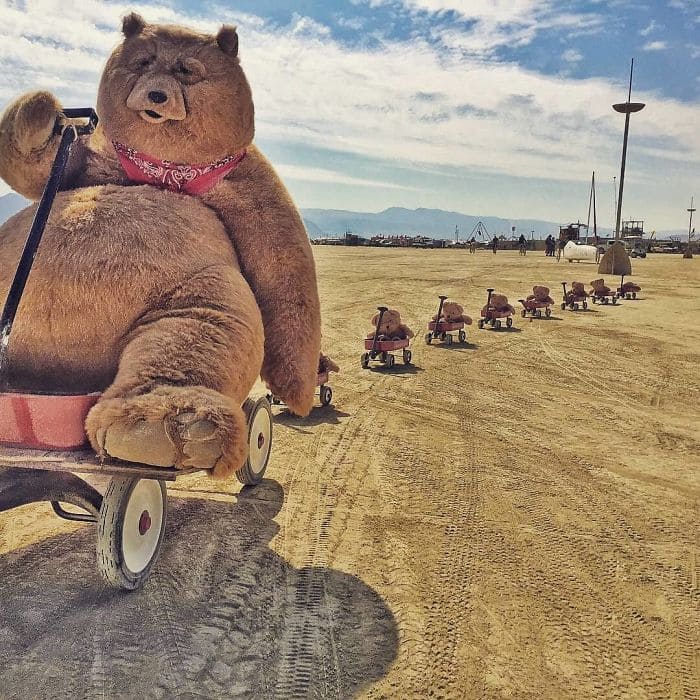 Huge teddy bear in a wheelbarrow 