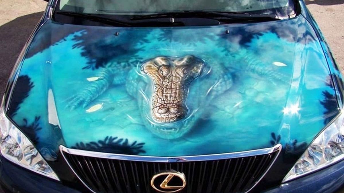 A crocodile emerging from an engine