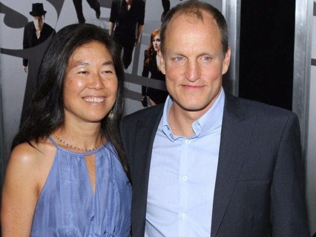 Woody Harrelson and Laura Louie 