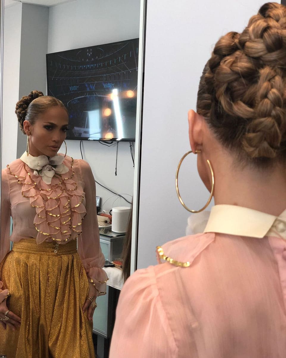 Jennifer Lopez looking in the mirror