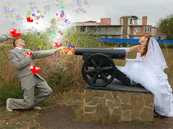 photoshopped photo of bride shooting hearts at her groom with a cannon