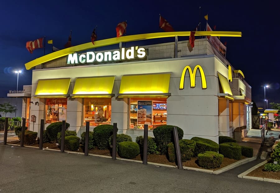Photograph of a McDonald's restaurant in the evening. 