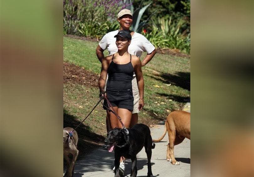 Queen Latifah with Jeanette Jenkins walking the dogs. 