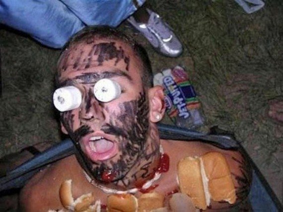 Guy sleeping with food and markings on his face
