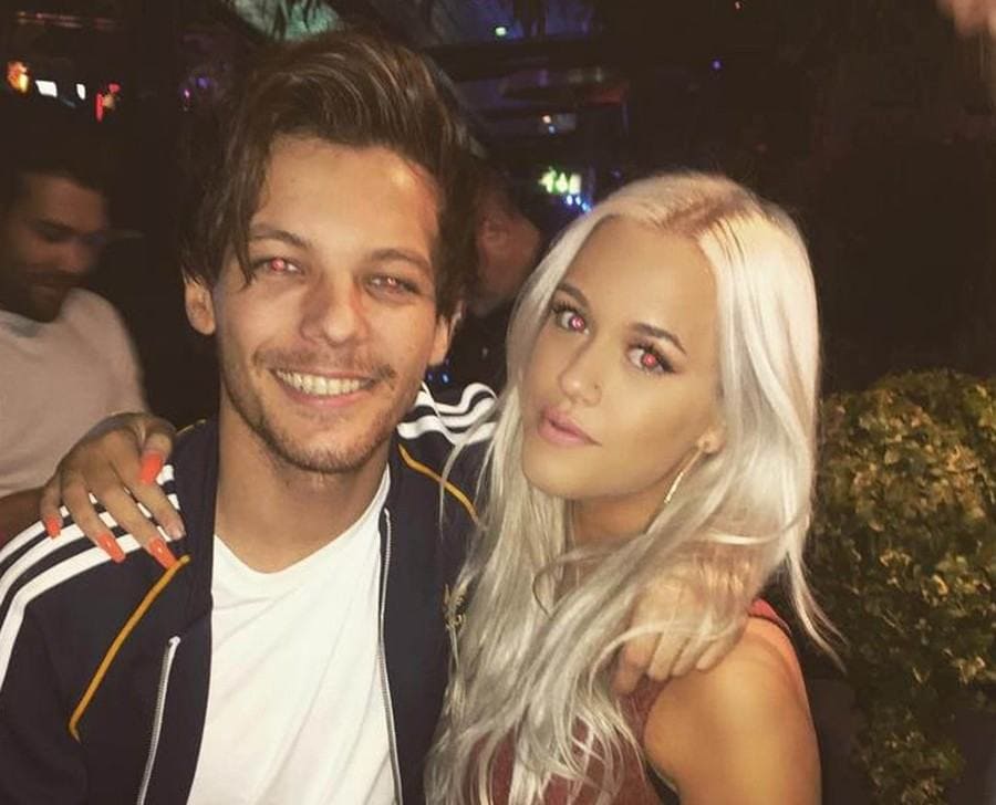 Lottie and Louis Tomlinson are posing together. 