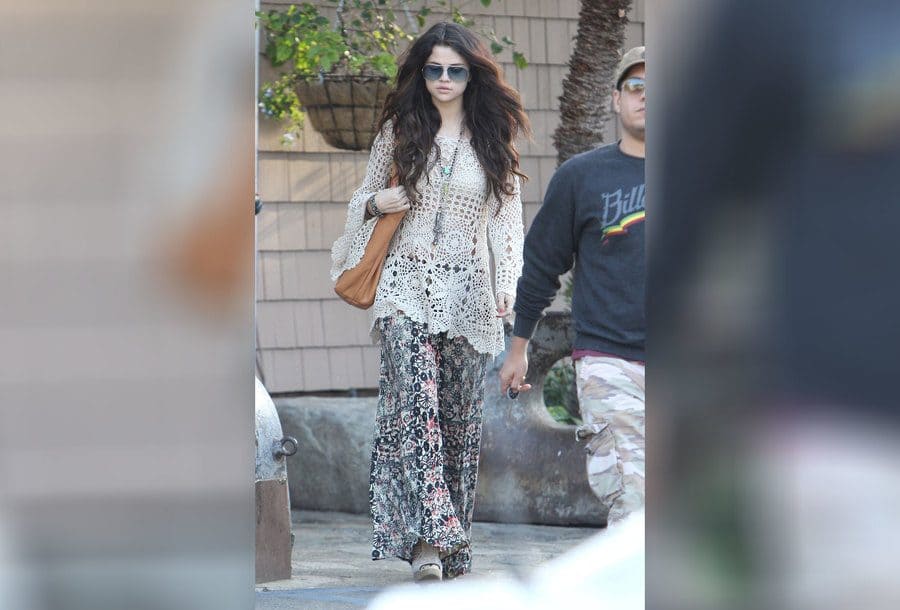 Selena Gomez is walking around in boho-chic clothing. 