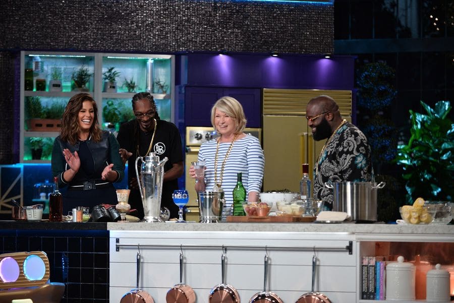 Ashley Graham, Rick Ross, Martha Stewart, and Snoop Dogg on an episode of Martha & Snoop’s Potluck Dinner Party. 