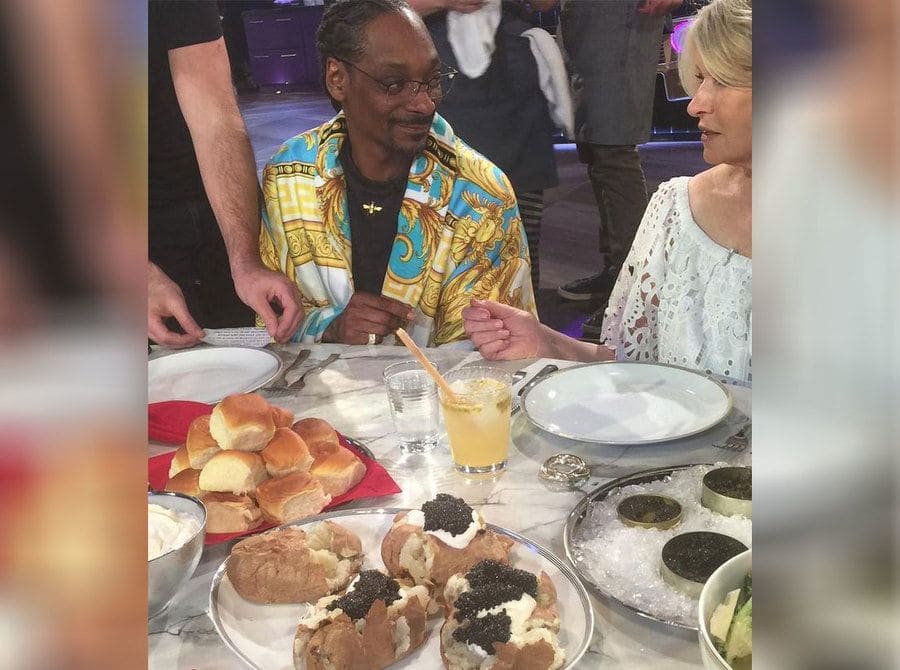 Martha and Snoop indulging in some caviar, potatoes, and bread rolls. 