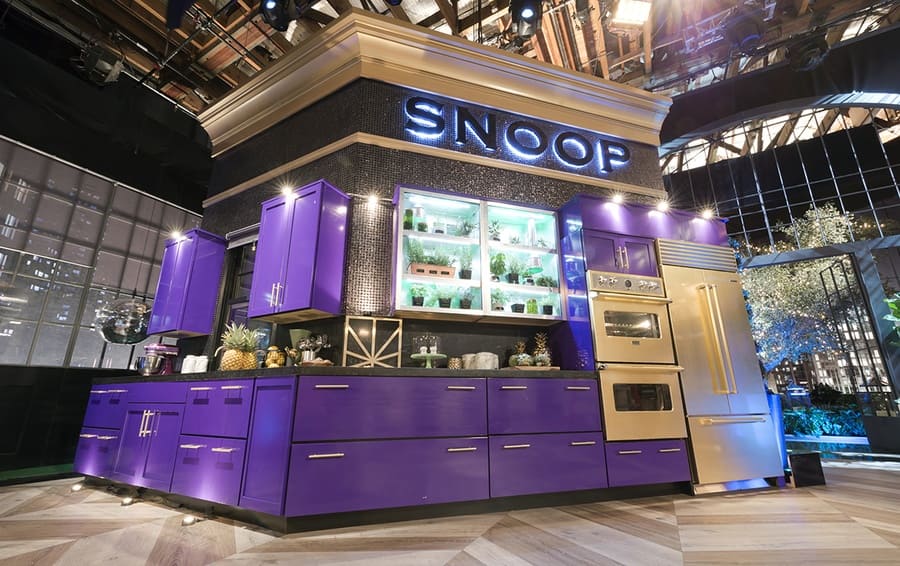 Snoop Dogg’s side of the kitchen with his gold refrigerator. 