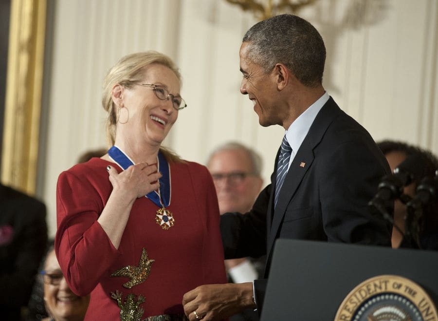Meryl Streep thanking Barack Obama for the Medal of Freedom next to the podium. 