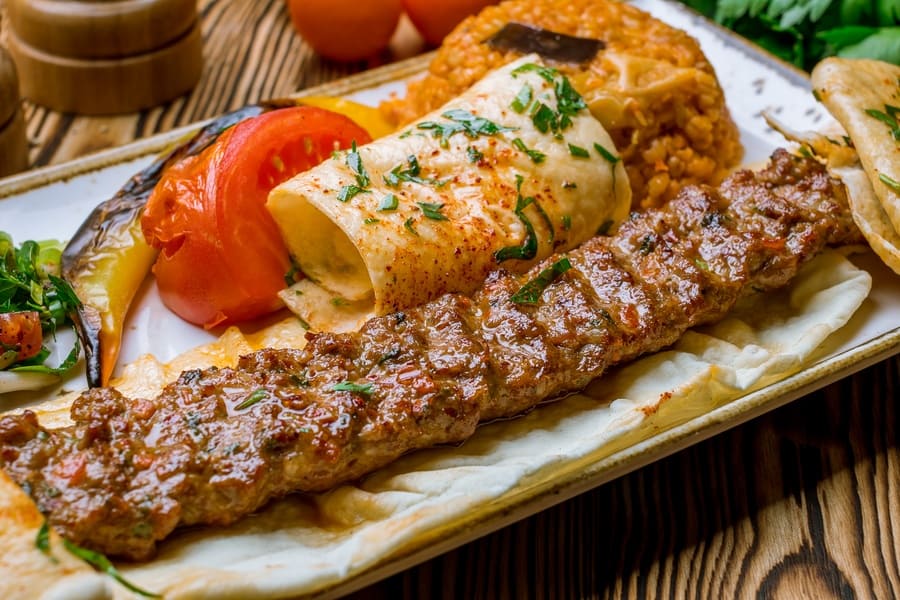 Photograph of a spicy Turkish kebab. 