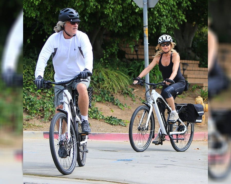 Kurt Russell and Goldie Hawn out and about riding bikes together in 2018.