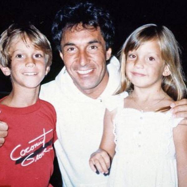Oliver and Kate as children take a picture with their father, Bill Hudson. 