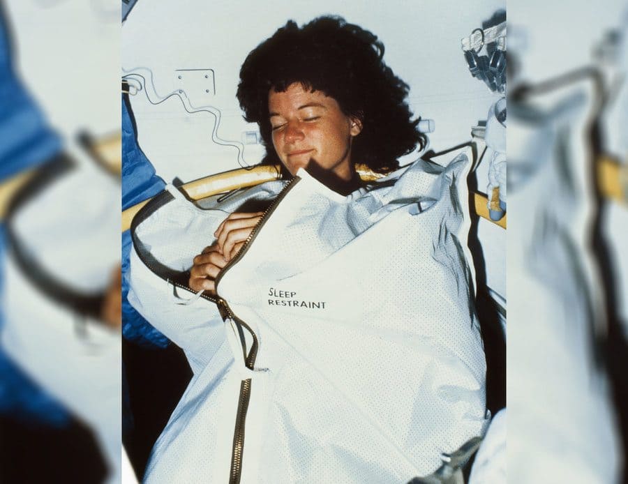 Salle Ride in a sleep restraint device on the space shuttle Challenger during the Sts-7 mission in 1983.