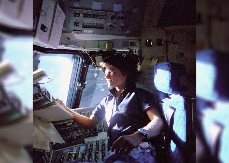 Sally Ride monitoring control panels from the pilot's chair on the flight deck of the Space Shuttle Challenger on June 25th, 1983. 