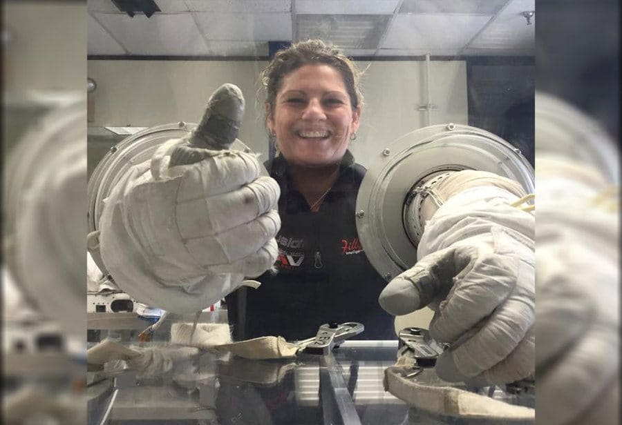 Summer Worden with astronaut gloves 