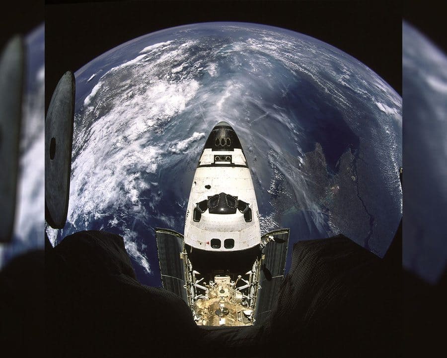 Earth and NASA's Space Shuttle Atlantis