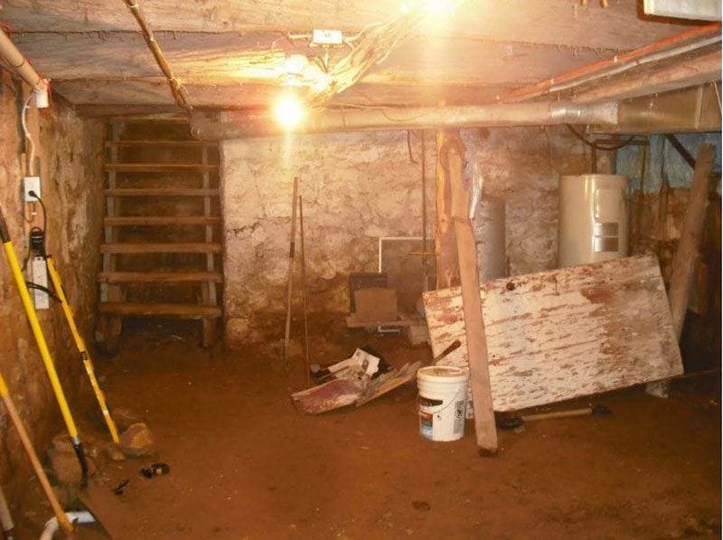 The basement before the renovation, without any floor