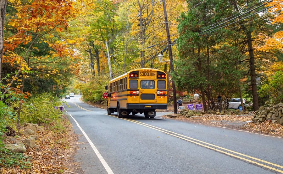 A school bus driving away 