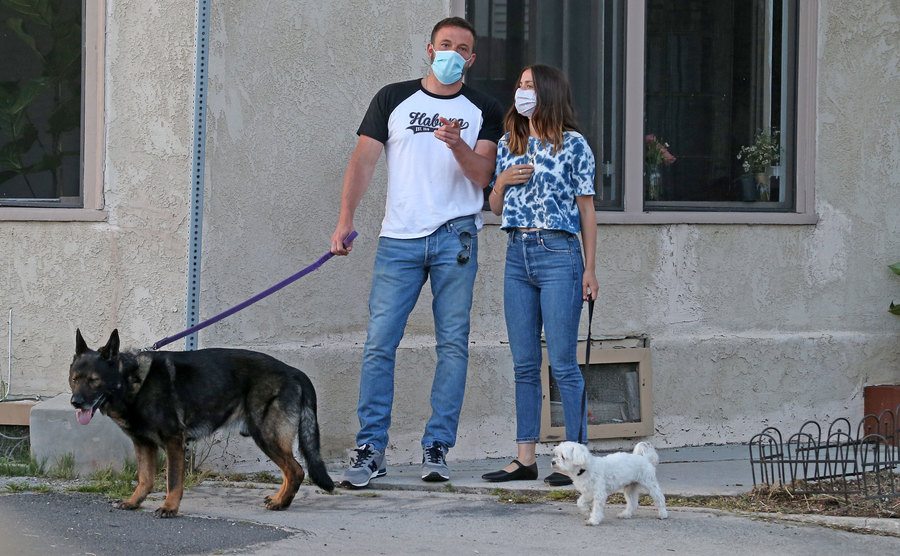Ana de Armas chatting with Ben Affleck while out on a walk with the dogs 