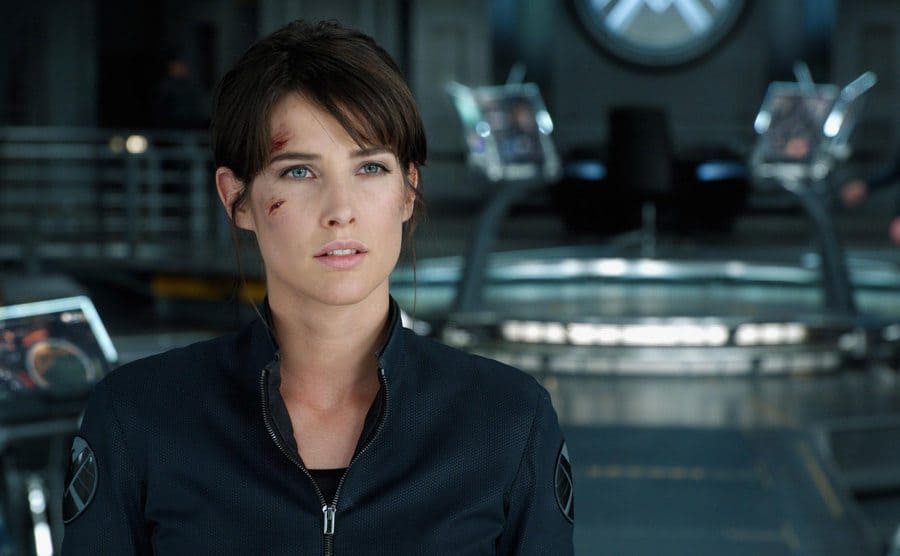 Cobie Smulders dressed as Maria Hill in an athletic jacket and a ponytail in the film Avengers, 2012