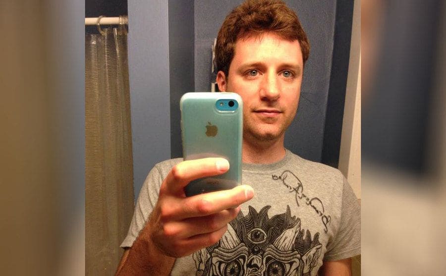 Doug Lindsay taking a selfie in the mirror 