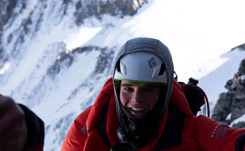 Matt Moniz on the side of Everest having a hot drink 