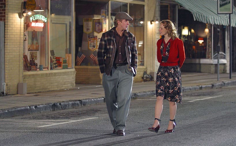 Rachel McAdams and Ryan Gosling walking down the middle of the road during a date in ‘The Notebook.’