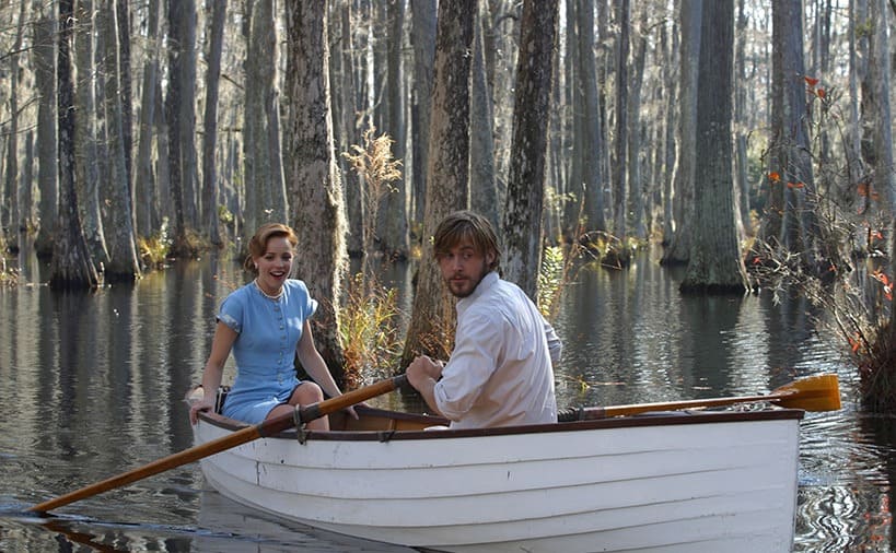 Rachel McAdams and Ryan Gosling in a boat on the lake in ‘The Notebook.’