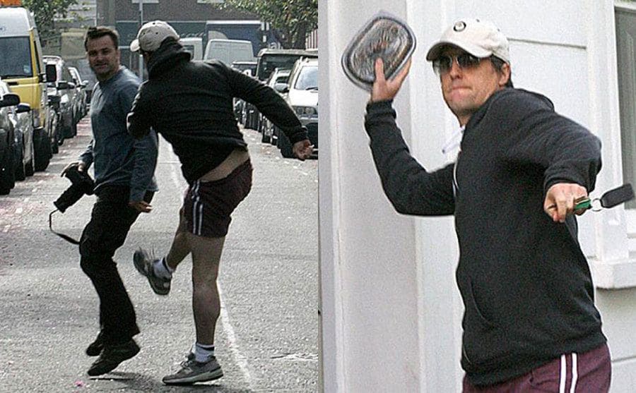 Hugh Grant trying to kick a photographer standing near him in the road while he was out for a run. / Hugh Grant holding up a takeaway container filled with food, ready to throw it at photographers. 