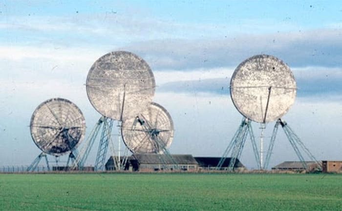 RAF Stenigot, tropospheric scatter dishes around some homes in the middle of a large field 