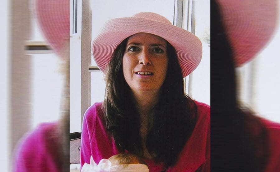 Picture of Lori Ruff with a pink hat on top