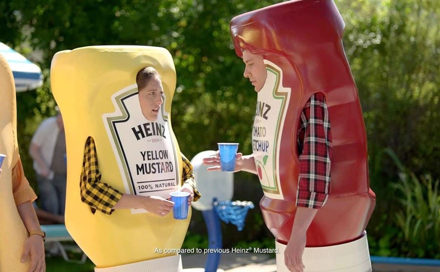 Ingrid Haas wearing a mustard bottle in the Heinz commercial 