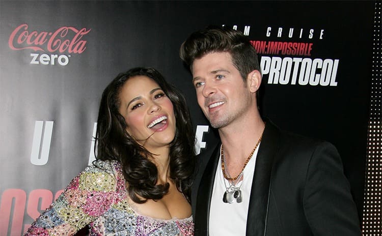 Paula Patton and Robin Thicke at a red-carpet event 