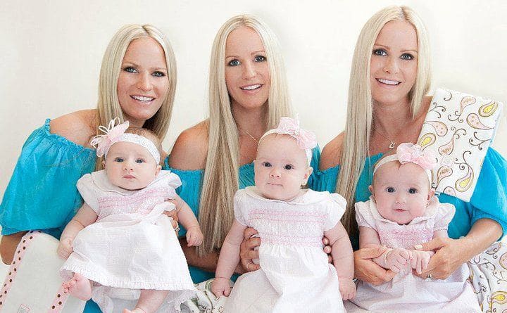 The triplets with their baby girls 