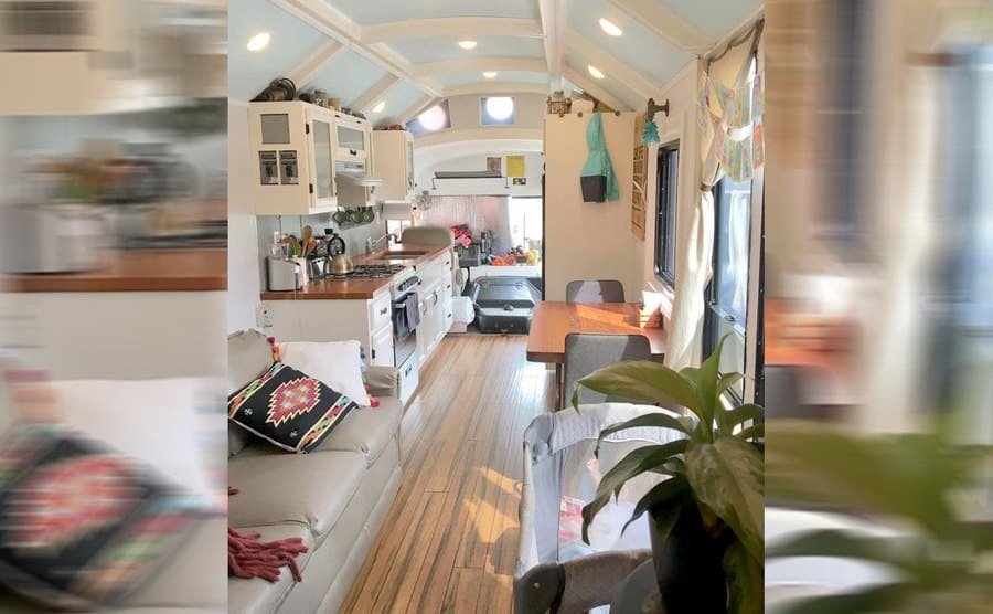 The interior of the school bus with a beautiful kitchen and living room 