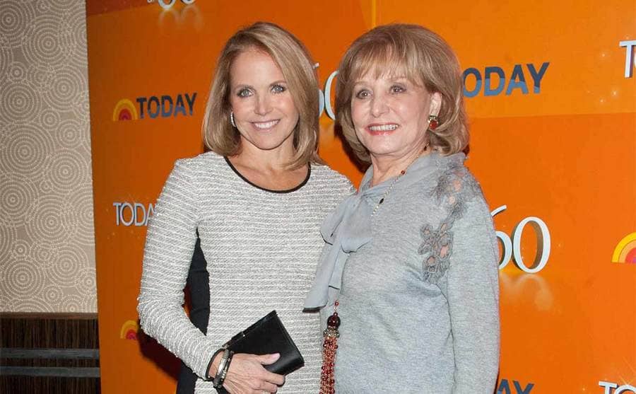 Katie Couric and Barbara Walters posing together on the red carpet 