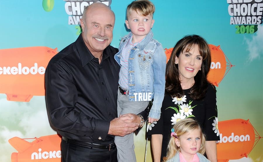 Dr. Phil and Robin with two grandchildren on the red carpet in 2016