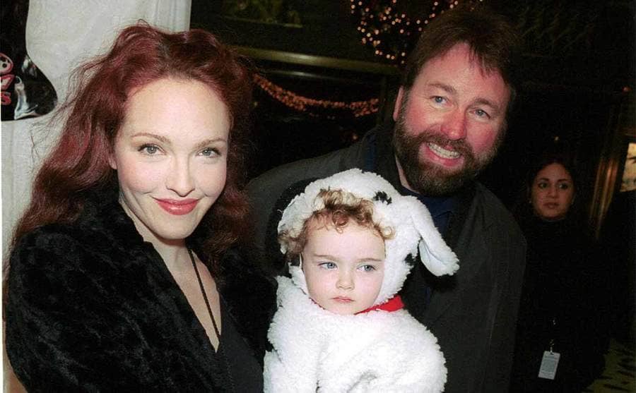 Amy Yasbeck, John Ritter, and their daughter dressed like a Dalmatian on the red carpet for 102 Dalmatians premiere 