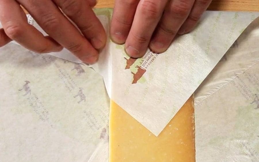 Cheese wrapped in paper