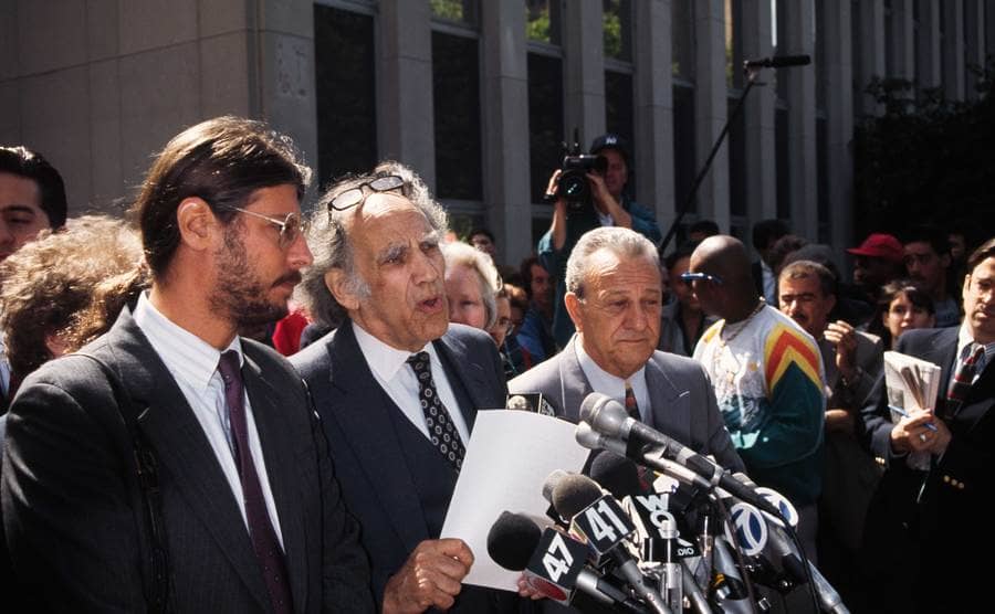 Lawyers Ron Koby and William Kunstler, and Joe DeCicco talking to the press