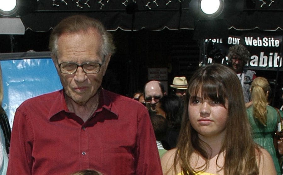 Larry King and Chaia King on the red carpet when she was younger 