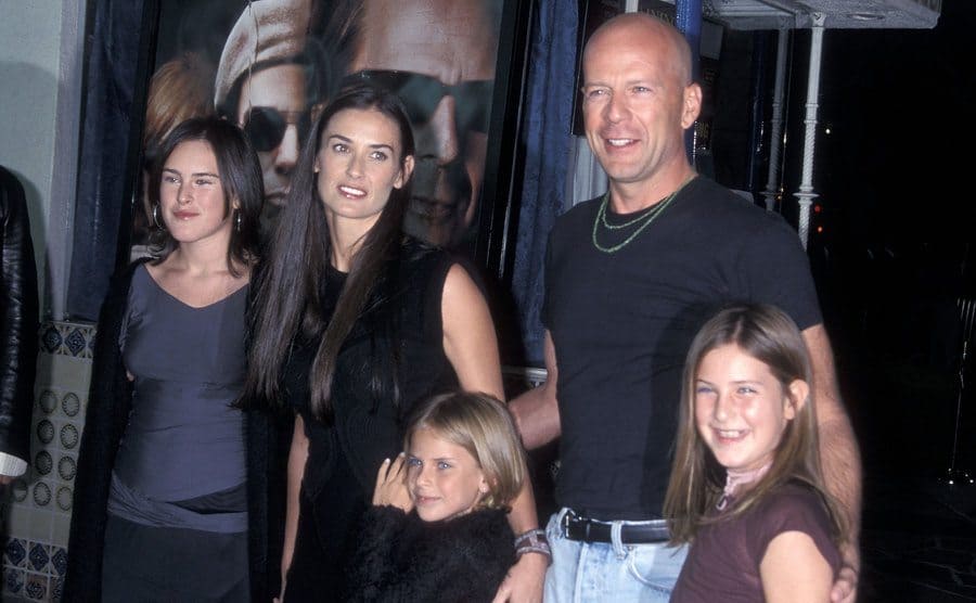 Demi Moore and Bruce Willis with their three children on the red carpet 