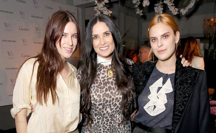 Demi Moore with Scout and Tallulah Willis at an event 