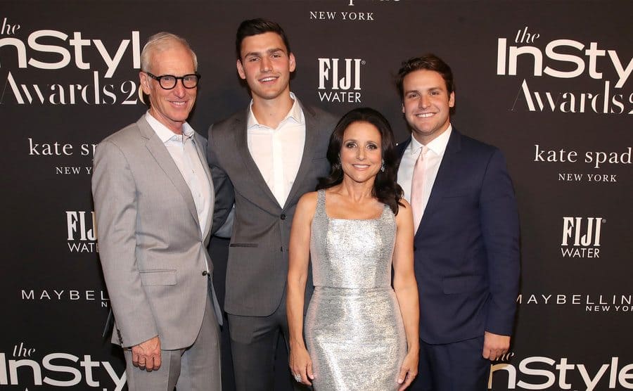 Julia Louis-Dreyfus with her sons and husband on the red carpet