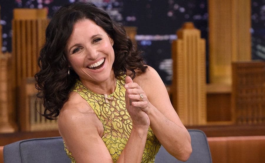 Julia Louis-Dreyfus sitting on a couch on The Tonight Show starring Jimmy Fallon 