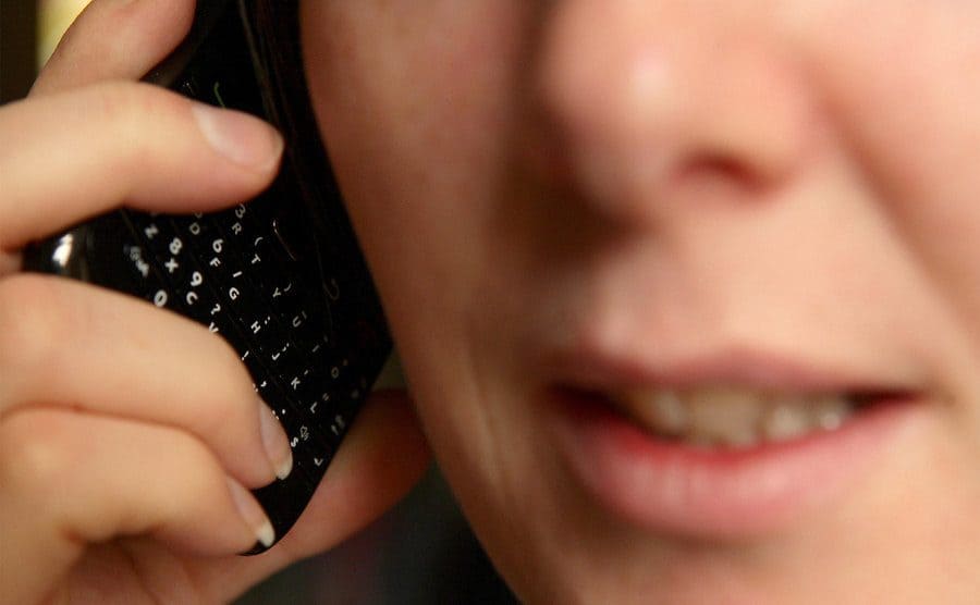 A close-up of a woman talking on a cellphone. 