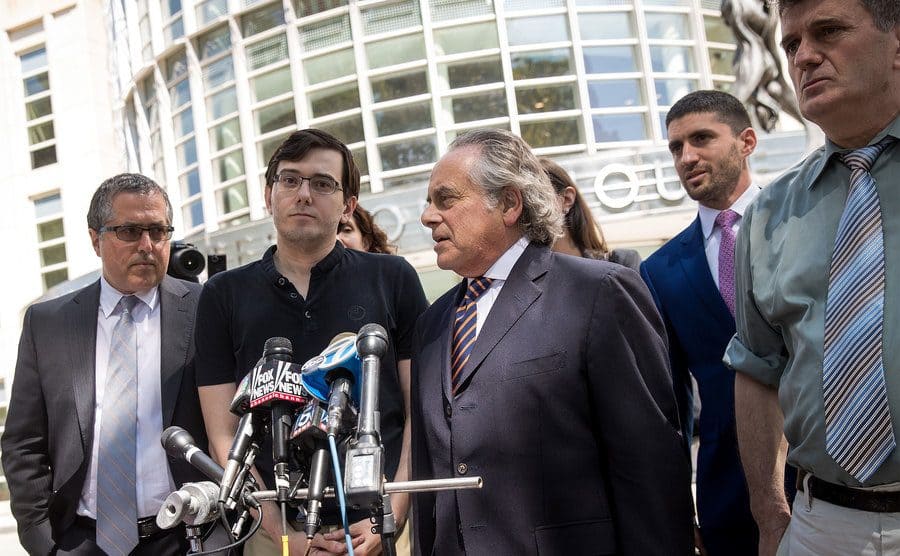 Shkreli standing outside the courthouse and holding a press conference. 